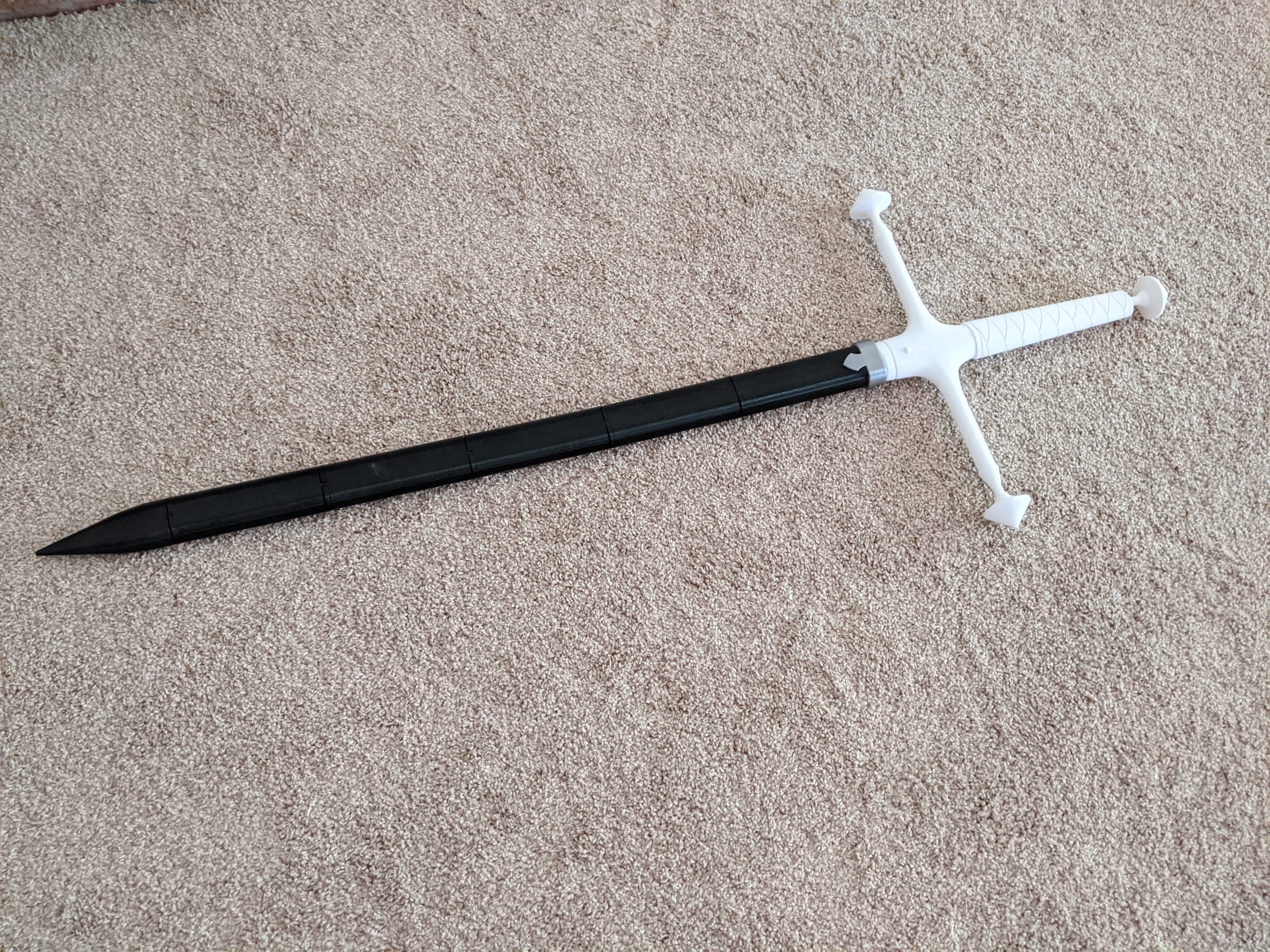 Photograph of a finished 3D printed sword with all pieces assembled