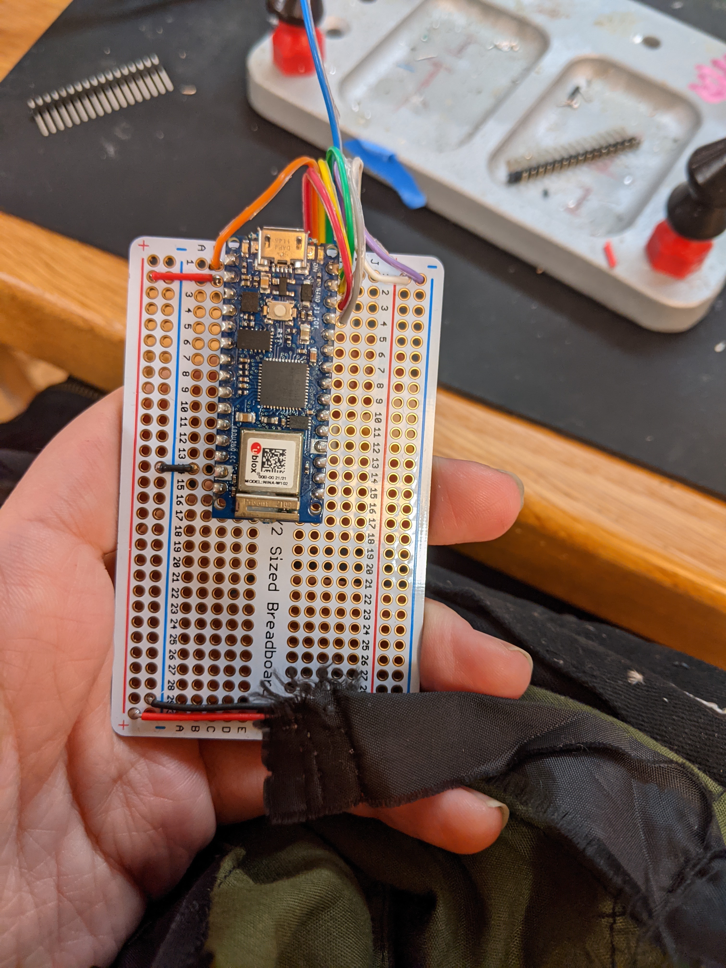 Photograph of soldering RFID I2C cables to a protoboard